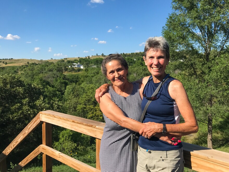 During their visit, the author's mother, Jeannie Siegler (right), reunited with family friend Jody Waln, a Rosebud Sioux tribal member and social worker who now runs a shelter for abandoned children.