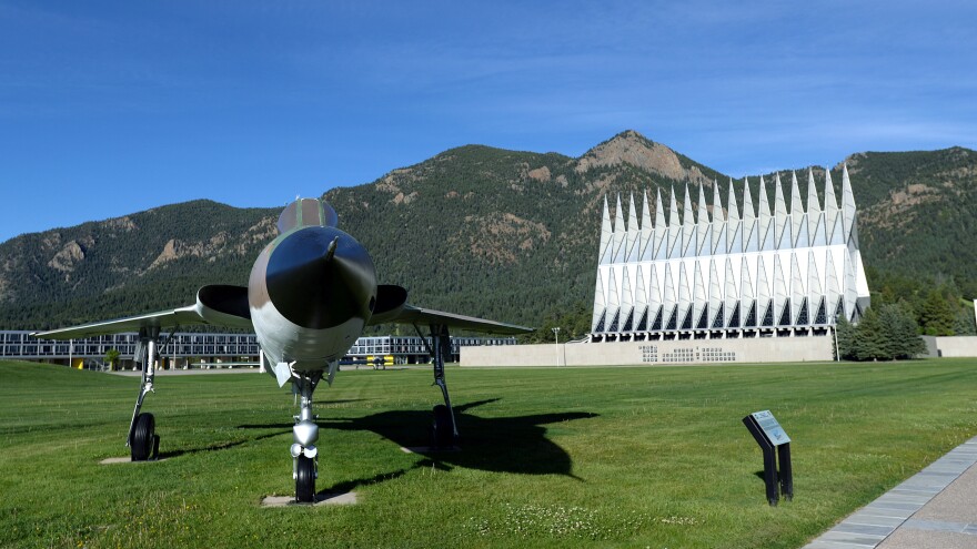 The U.S. Air Force Academy has completed its investigation into an incident of racist graffiti on campus. The school's terrazzo and chapel are seen here in Colorado Springs, Colo., this summer.