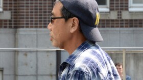 Publicity-shy Japanese author Haruki Murakami arrives to give a public lecture in Kyoto in May 2013.