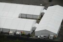 Work progresses on a new migrant detention facility dubbed "Alligator Alcatraz," at Dade-Collier Training and Transition facility in the Florida Everglades, Friday, July 4, 2025, in Ochopee, Fla. (AP Photo/Rebecca Blackwell)