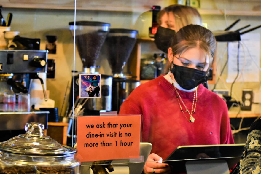 A young worker takes orders at the Blackbird Cafe in Valparaiso.