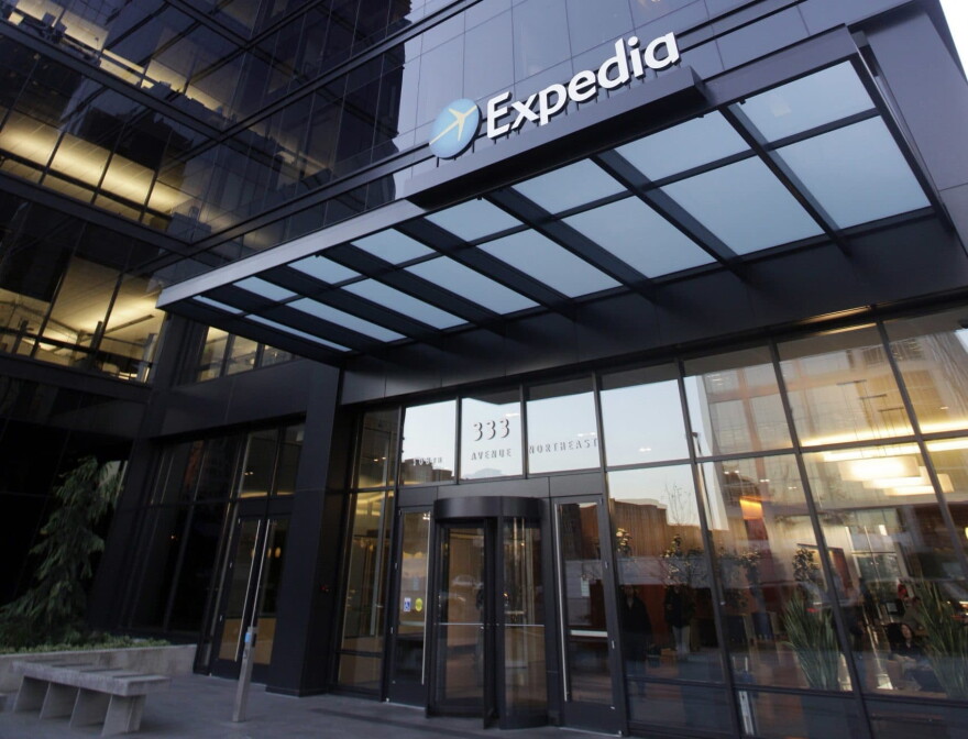 In this Tuesday, Jan. 15, 2013, file photo, a building housing Expedia is seen in Bellevue, Wash. (Elaine Thompson, File/AP)
