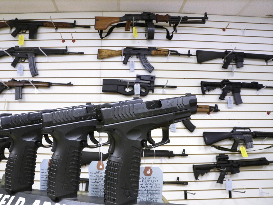 Assault weapons and hand guns for sale.