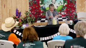 Margaret Viebrock, director of WSU Chelan and Douglas County Extension, leads a sauerkraut seminar at the Chelan County Fair in Cashmere.