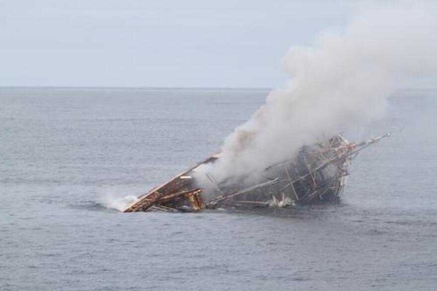 The Japanese fishing vessel, Ryou-Un Maru, sinks in the Gulf of Alaska after receiving significant damage from the Coast Guard Cutter Anancapa crew firing explosive ammunition into it 180 miles west of the Southeast Alaskan coast April 5, 2012. The crew was successful and sank the vessel at 6:15 p.m. in 6,000 feet of water by using explosive ammunition and filling it with water. U.S. Coast Guard photo by Petty Officer 2nd Class Brandon Thomas.