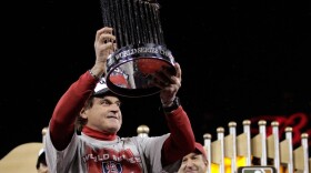 <p>Cardinals manager Tony La Russa celebrated with the World Series trophy Friday night in St Louis.</p>