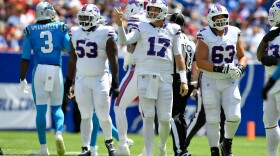 Buffalo Bills quarterback Josh Allen (17) signals for a first down after a penalty during the first half of a preseason NFL football game against the Carolina Panthers, Saturday, Aug. 15, 2026, in Orchard Park, N.Y.