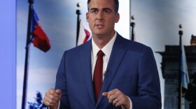 Oklahoma Republican candidate for Governor, Kevin Stitt, answers a question during a debate with Democratic candidate Drew Edmondson in Oklahoma City, Wednesday, Oct. 24, 2018. 