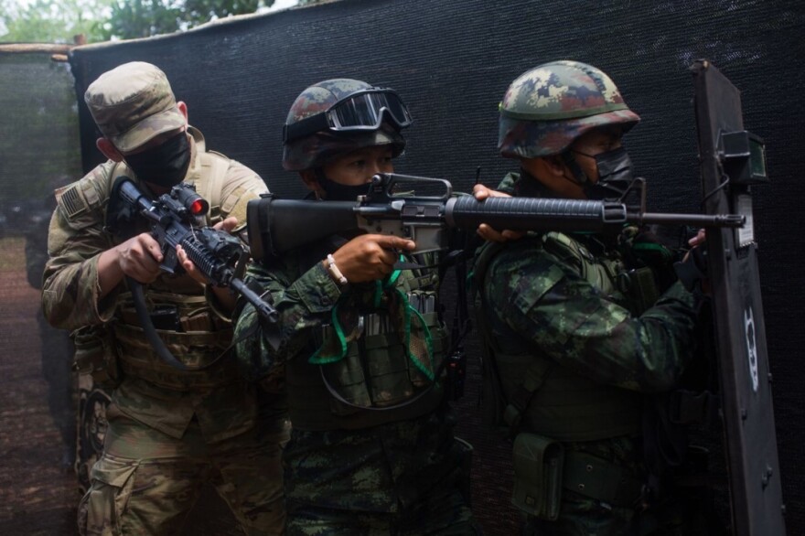 U.S. Army Pfc. Ayden Walk, a rifleman with Bravo Company, 5th Battalion, 20th Infantry Regiment, 1-2 Stryker Brigade Combat Team, and two Royal Thai Army soldiers with 1st Infantry Battalion, 15th Infantry Regiment, practice clearing a room during Close Quarters Combat training, as part of Exercise Cobra Gold 21, in Krabi, Kingdom of Thailand, Aug. 4, 2021. (U.S. Marine Corps photo by Staff Sgt. David Staten)