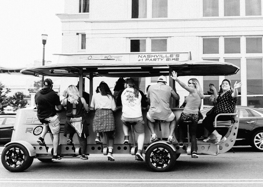 A pedal tavern is a multiseated bicycle you ride with a group, while drinking. Nashville visitors cannot get enough of them.