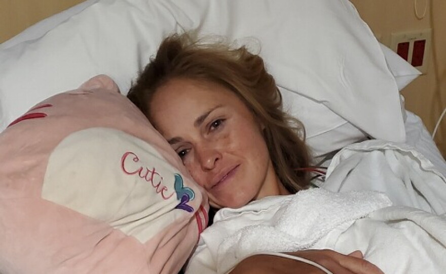 Tiffany Storrs shows her "fight" after undergoing cochlear implant surgery.