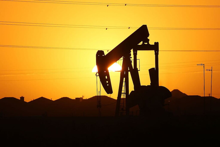 A pumpjack  sits on the outskirts of town at dawn in the Permian Basin oil field on January 21, 2016 in the oil town of Midland, Texas. (Spencer Platt/Getty Images)