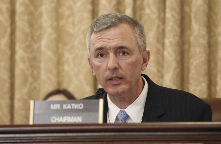 A nameplate sits in front of Congressman John Katko. 