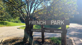 Park sign and tree. Sign says French Park