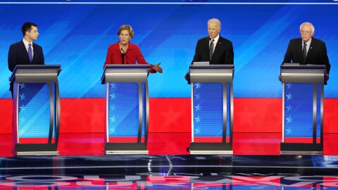 Amy Klobuchar and Michael Bloomberg join these four candidates — Pete Buttigieg (left), Elizabeth Warren, Joe Biden and Bernie Sanders — onstage Wednesday night.