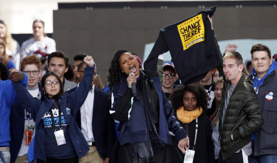 Jennifer Hudson (center) performs at the March for Our Lives.