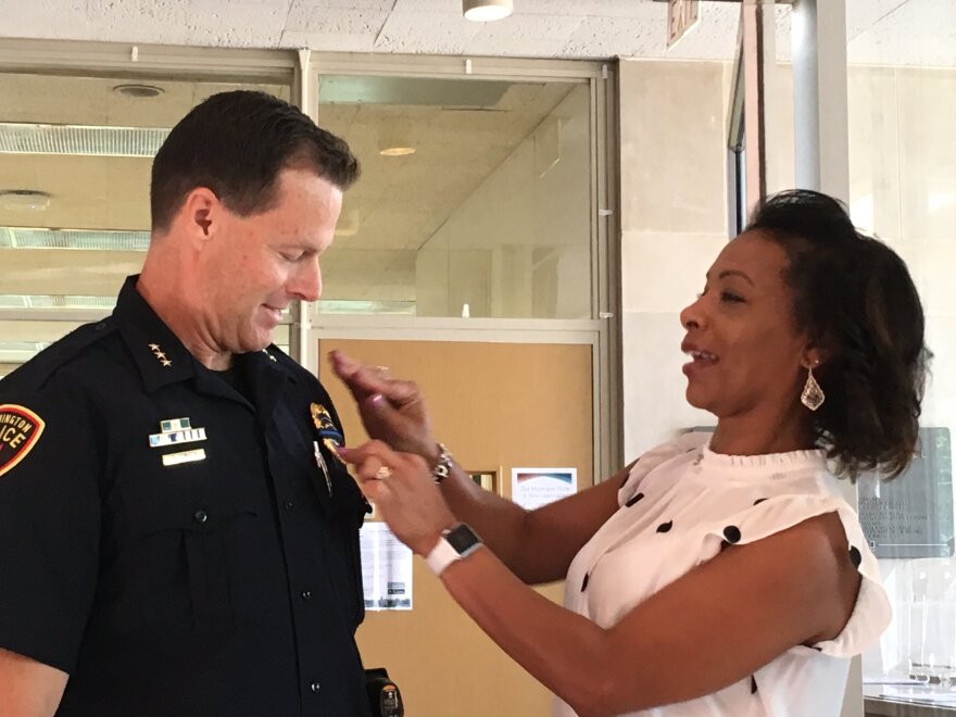 Dan Donath and Connie his wife pinning his new badge