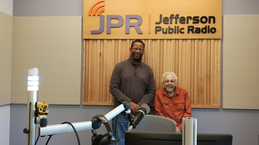 Jefferson Exchange host Mike Green with Emily Simon, Emeritus Chair of the Social Equity and Racial Justice Advisory Committee for the City of Ashland, Oregon. Photo at the JPR studio on June 17, 2025.