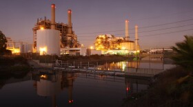 The court battle starts this week on the Obama administration's environmental regulations on greenhouse gas emissions from power plants and large industrial facilities. The photo shows the AES Corporation 495-megawatt Alamitos natural gas-fired power station on Oct. 1, 2009, in Long Beach, Calif. (David McNew/Getty Images) 