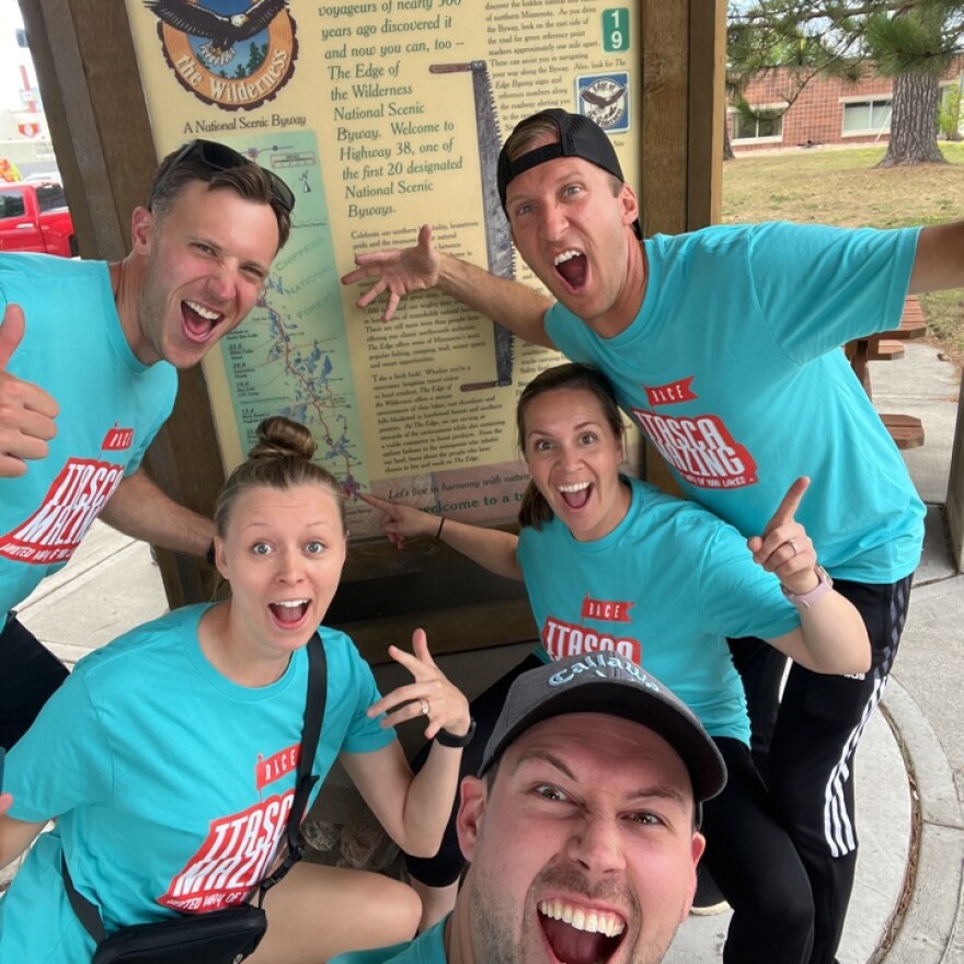 Itasca-mazing Race team Threat Level Midnight takes a selfie at the Edge of the Wilderness Scenic Byway in Grand Rapids during the 2023 event. The event is a fundraiser for United Way of 1000 Lakes.