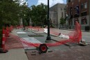 One of the construction projects occurring on Kirkwood Avenue involves replacing bricks on the sidewalk.