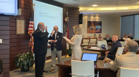 From left to right - Wilson, Funderburk, and Moskowitz being sworn in by Michelle Lee.