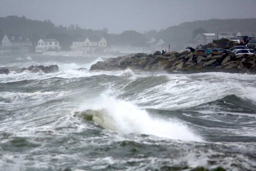 People watch the ocean as a nor'easter storm hits Rye, New Hampshire, Sunday, Sept. 27, 2026. 