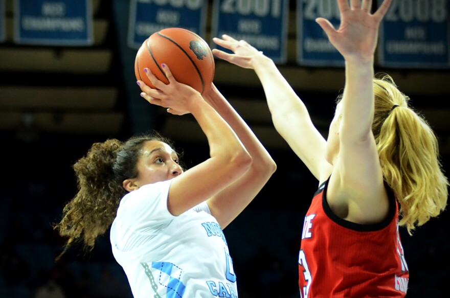  N.C. State's Elissa Cunane challenges a shot by UNC's Alexandra Zelaya on Jan. 30, 2022 at UNC's Carmichael Arena in Chapel Hill.