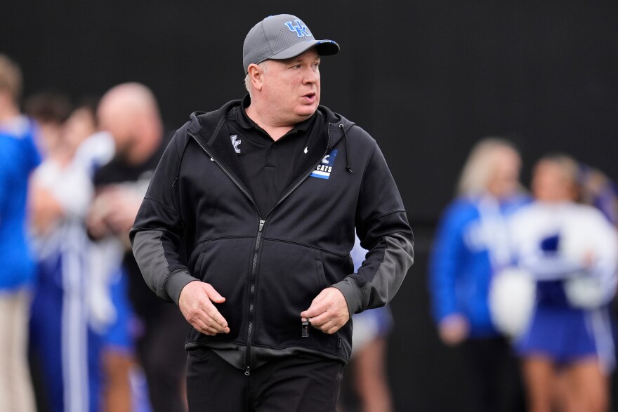 Kentucky head coach Mark Stoops walks the field before an NCAA college football game against Vanderbilt, Saturday, Nov. 22, 2025, in Nashville, Tenn.