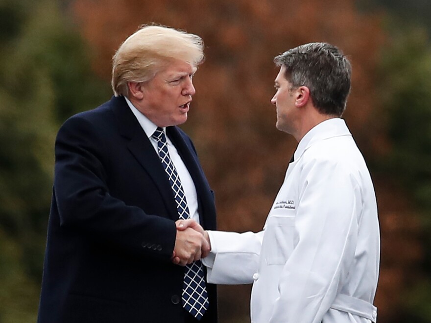 President Trump described White House physician and former Cabinet nominee Ronny Jackson on Friday as an "American hero."