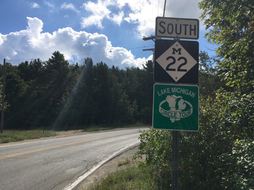 An M-22 sign marks the state highway in northern Michigan that's considered one of the nation's most scenic drives.