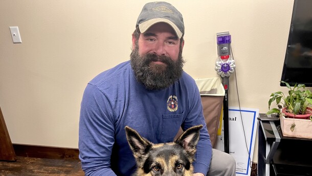 Veteran Zach Brunette with his 18-month German Shepherd Coleman