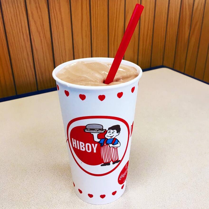 A HiBoy DriveIn milkshake with a red straw.