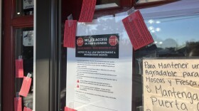 On November 19, 20205,a restaurant in Durham displays a sign intended to keep immigration enforcement agents away.