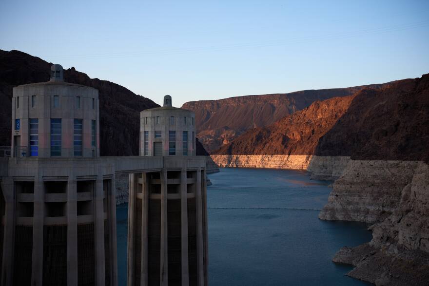 A bathtub ring of light minerals shows the high water line of Lake Mead amid a drought near Hoover Dam at the Lake Mead National Recreation Area, Tuesday, June 30, 2026, near Boulder City, Nevada.