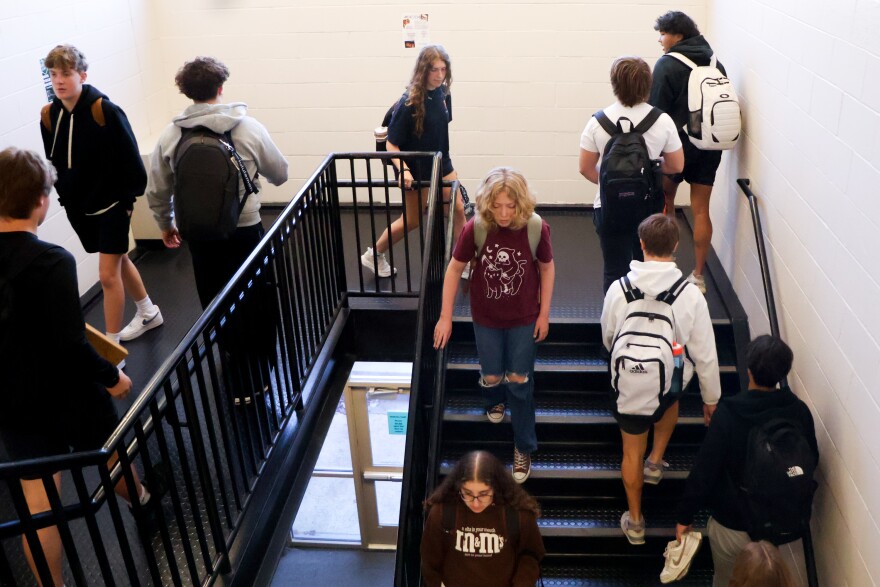 Rockwood Summit High School students walk the halls during a passing period at the school in Fenton.
