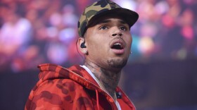 FILE - In this June 7, 2015 file photo, Chris Brown performs at the 2015 Hot 97 Summer Jam at MetLife Stadium in East Rutherford, N.J. (Photo by Scott Roth/Invision/AP, File)
