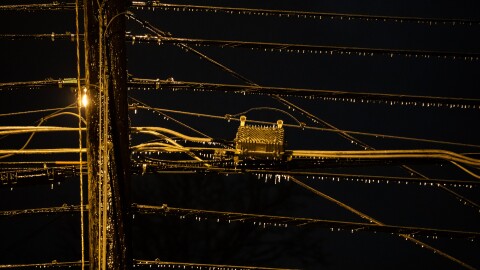 Icicles hang from a telephone pole and electricity power lines in south Austin during the ice, sleet, freezing rain and cold temperatures of Winter Storm Landon in Austin, TX on Feb. 2, 2022. Gabriel C. Pérez/KUT