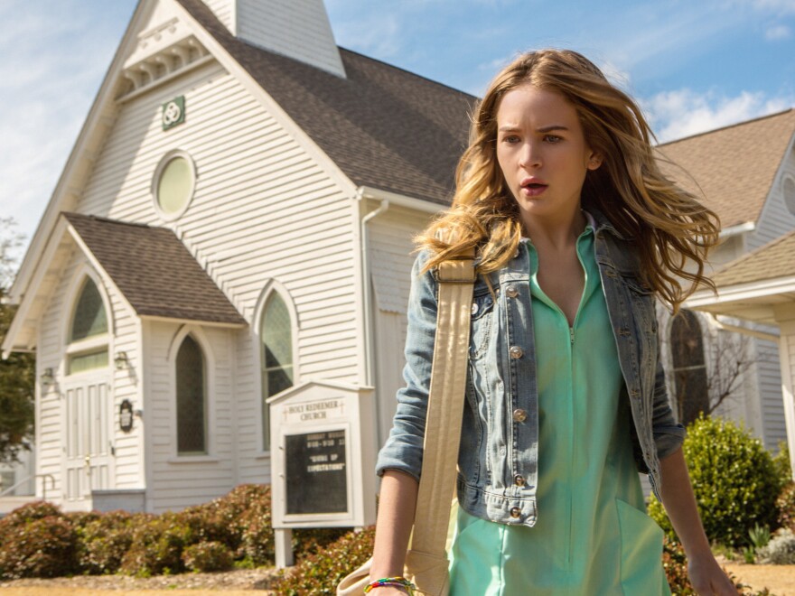 Britt Robertson plays Angie McAlister, a medical center volunteer who longs to escape the town and become a full-fledged nurse.