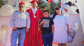 Lisandro Pacheco (second from left) is seen graduating from Park City High School.
