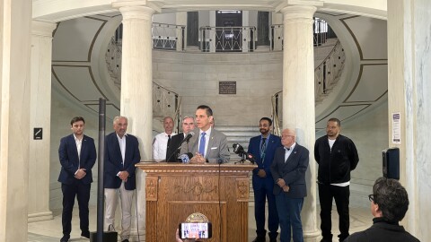 Assemblyman Santabarbara speaking with city and county leaders