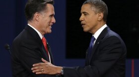 Romney and Obama shaking hands before debate