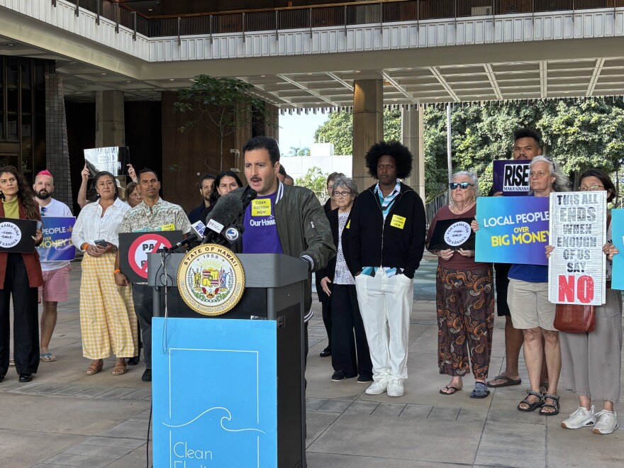 Evan Weber, a representative from the Clean Elections Hawaiʻi Coalition, calls on lawmakers to restore public trust in the campaign finance system on Feb. 23, 2026, at the Hawaiʻi State Capitol.