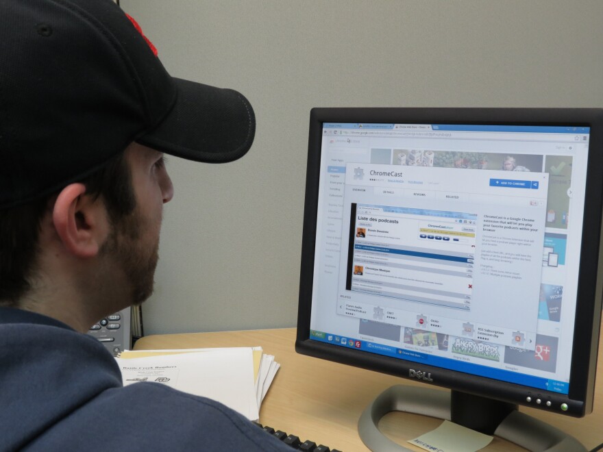 WMUK intern Michael Collins opens the download page for the ChromeCast player