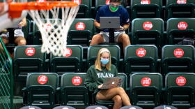 Tulane students attend class in Avron B. Fogelman Arena in the Devlin Fieldhouse.