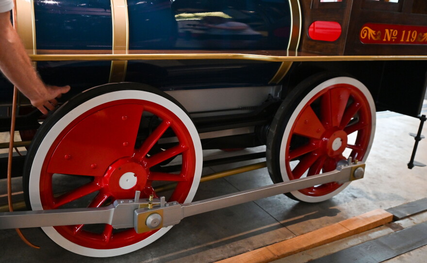 The train wheels have a rubber rim.