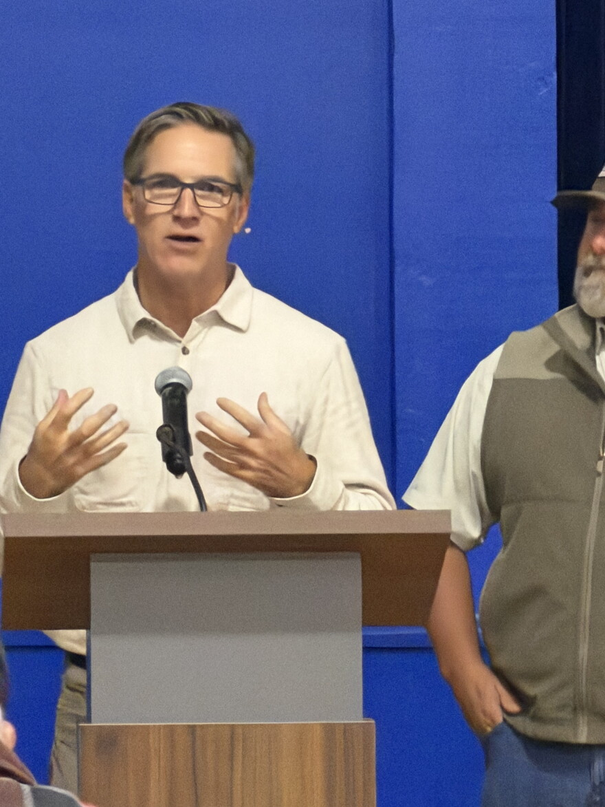 Lane County Commissioner Ryan Ceniga addresses the crowd during a Water District town hall event in the Mapleton school gym, Oct. 12, 2026.