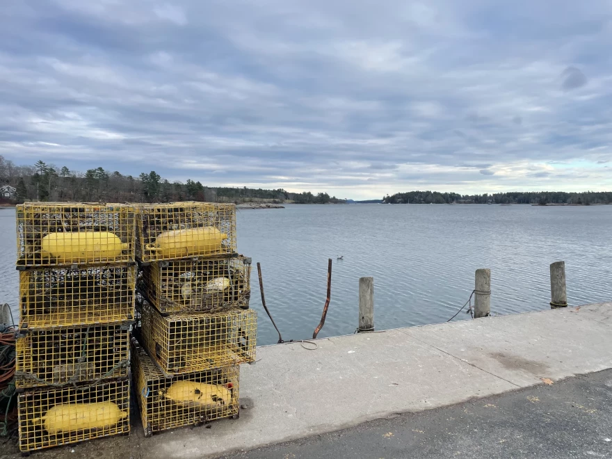 Lobster traps sit on a dock in Bluehill, Maine.