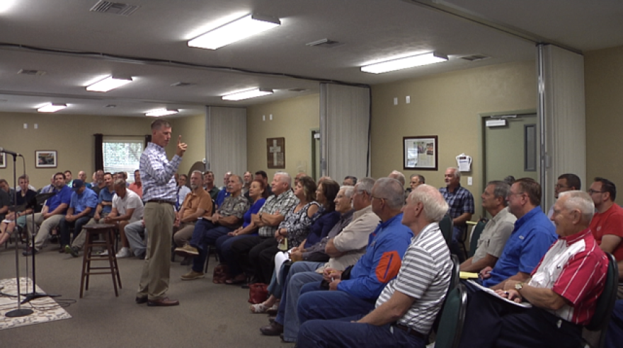 Dozens of people gather at North Central Baptist Church to learn about methods to keep churches safe in light of the Sutherland Springs shooting. Former UPD Lt. Stacy Ettel spoke to the group. (Victoria Pavlock/WUFT News)