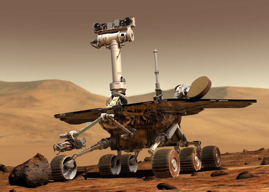 An artist's concept shows a NASA Mars exploration rover on the surface of Mars. The twin rovers Spirit and Opportunity were launched in 2003 and arrived at sites on Mars in January 2004.